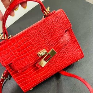 Small cute bag , like new.Red and gold.
